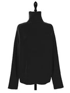 Gemütlicher-Rollkragenpullover-mit-geripptem-Strickmuster-und-lockerer-Passform,-perfekt-für-einen-stilvollen-und-wärmenden-Winterlook.