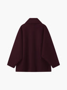 Eleganter-kurzmantel-mit-knopfverschluss-und-schlichtem-schnitt,-ideal-für-einen-zeitlosen-look.
