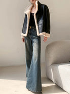 Kunstlederjacke–schwarz–gefüttert–kuschelig–schick–lässig–warme–Option.