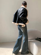 Kunstlederjacke–schwarz–gefüttert–kuschelig–schick–lässig–warme–Option.