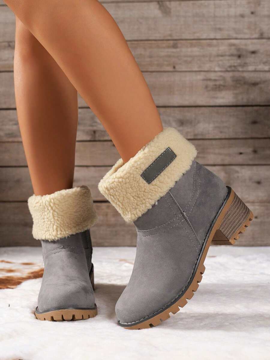 Stiefeletten-mit-warmem-Fellfutter-und-Blockabsatz,-ideal-für-einen-stilvollen-und-wärmenden-Winter-Look.