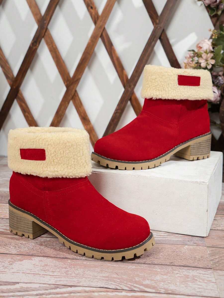 Stiefeletten-mit-warmem-Fellfutter-und-Blockabsatz,-ideal-für-einen-stilvollen-und-wärmenden-Winter-Look.