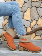 Stiefeletten-mit-warmem-Fellfutter-und-Blockabsatz,-ideal-für-einen-stilvollen-und-wärmenden-Winter-Look.