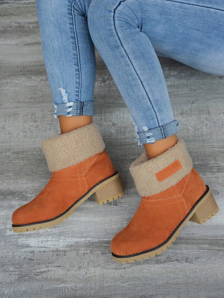 Stiefeletten-mit-warmem-Fellfutter-und-Blockabsatz,-ideal-für-einen-stilvollen-und-wärmenden-Winter-Look.