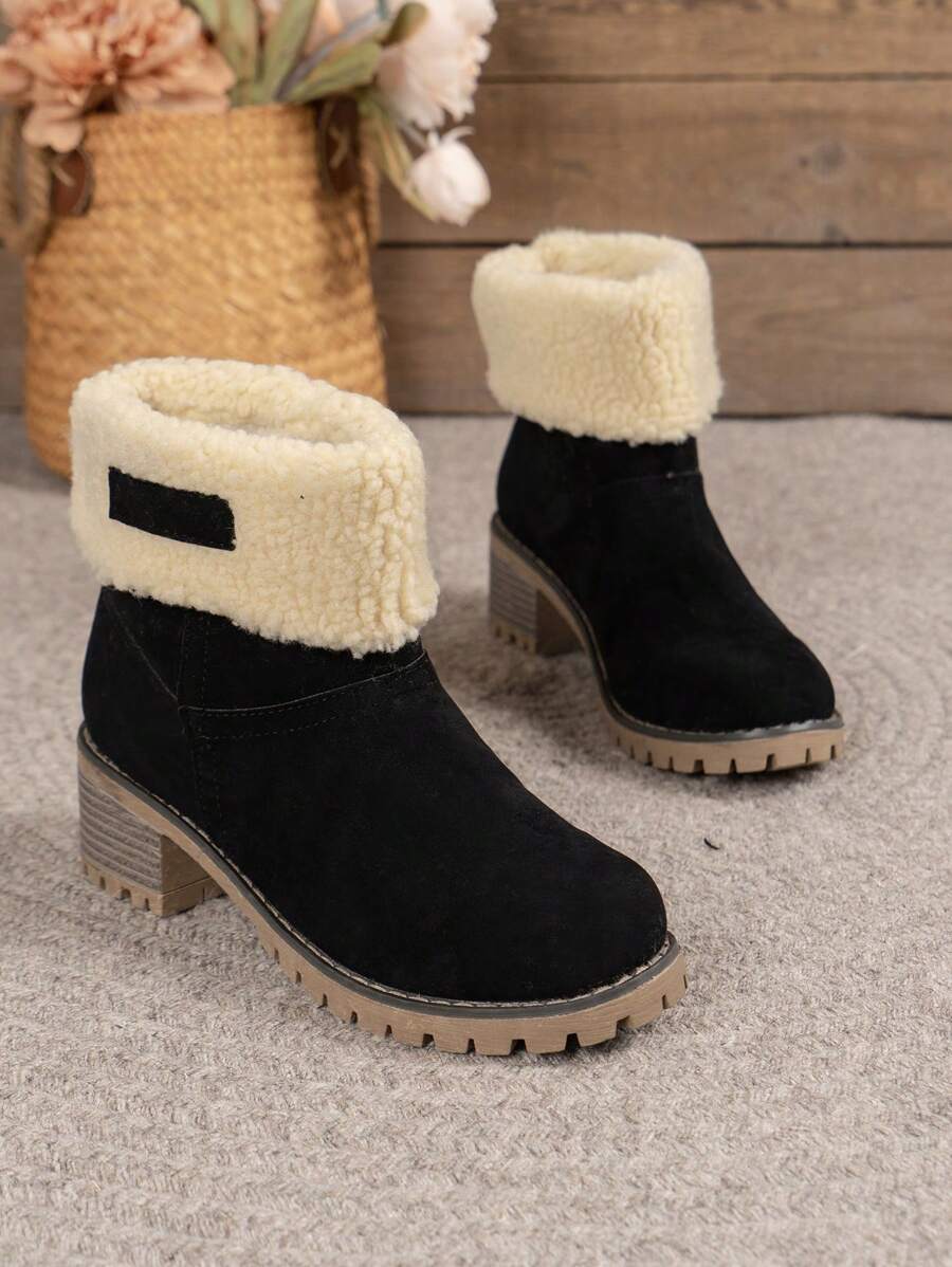 Stiefeletten-mit-warmem-Fellfutter-und-Blockabsatz,-ideal-für-einen-stilvollen-und-wärmenden-Winter-Look.