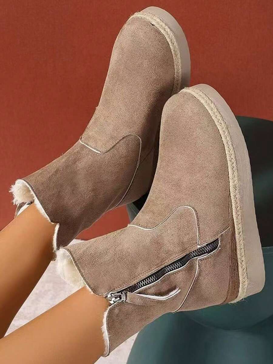 Warme-Stiefeletten-mit-weichem-Kunstfellfutter,-seitlichem-Reißverschluss-und-rustikalem-Design,-perfekt-für-einen-bequemen-Winter-Look.