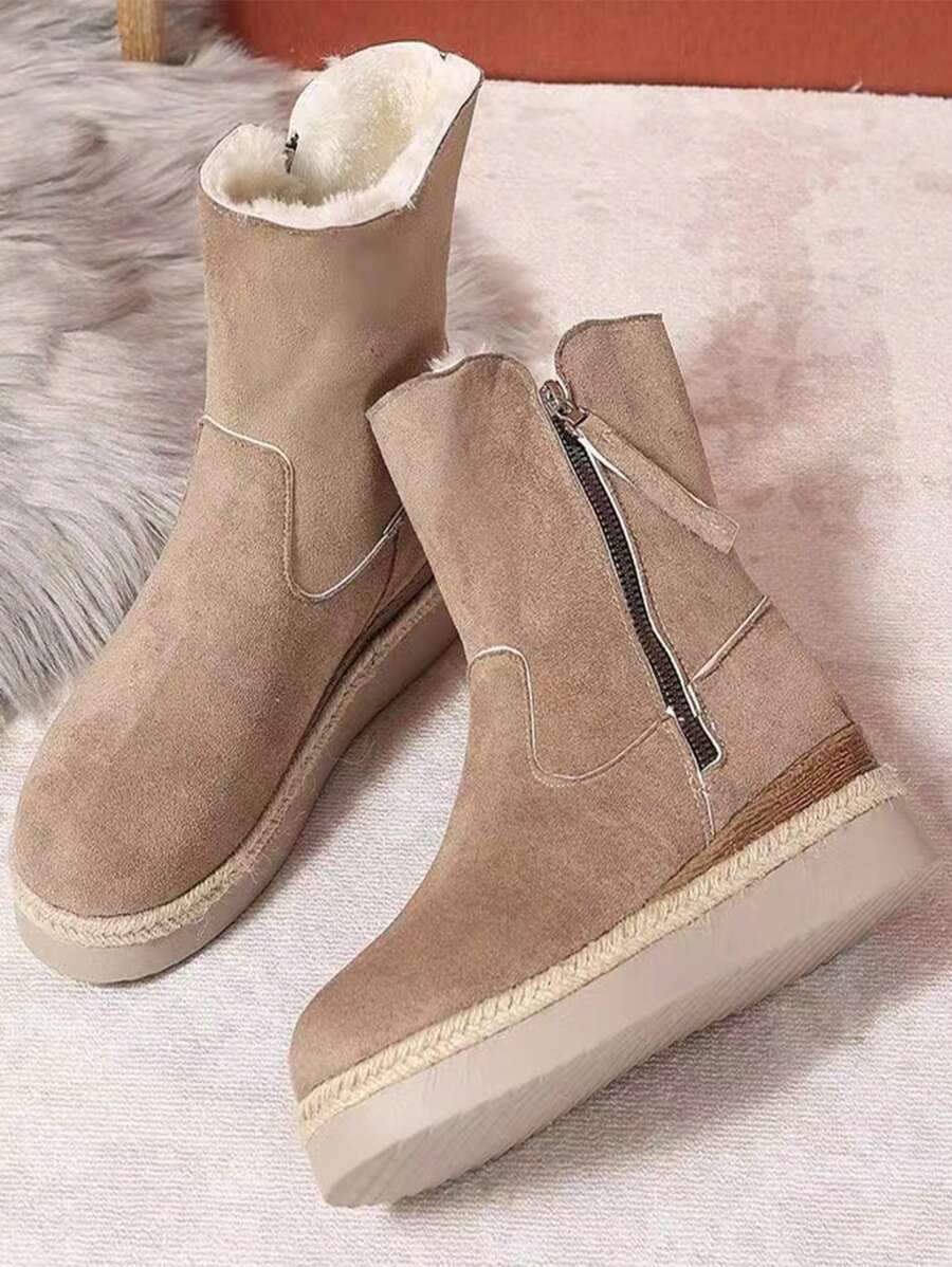 Warme-Stiefeletten-mit-weichem-Kunstfellfutter,-seitlichem-Reißverschluss-und-rustikalem-Design,-perfekt-für-einen-bequemen-Winter-Look.