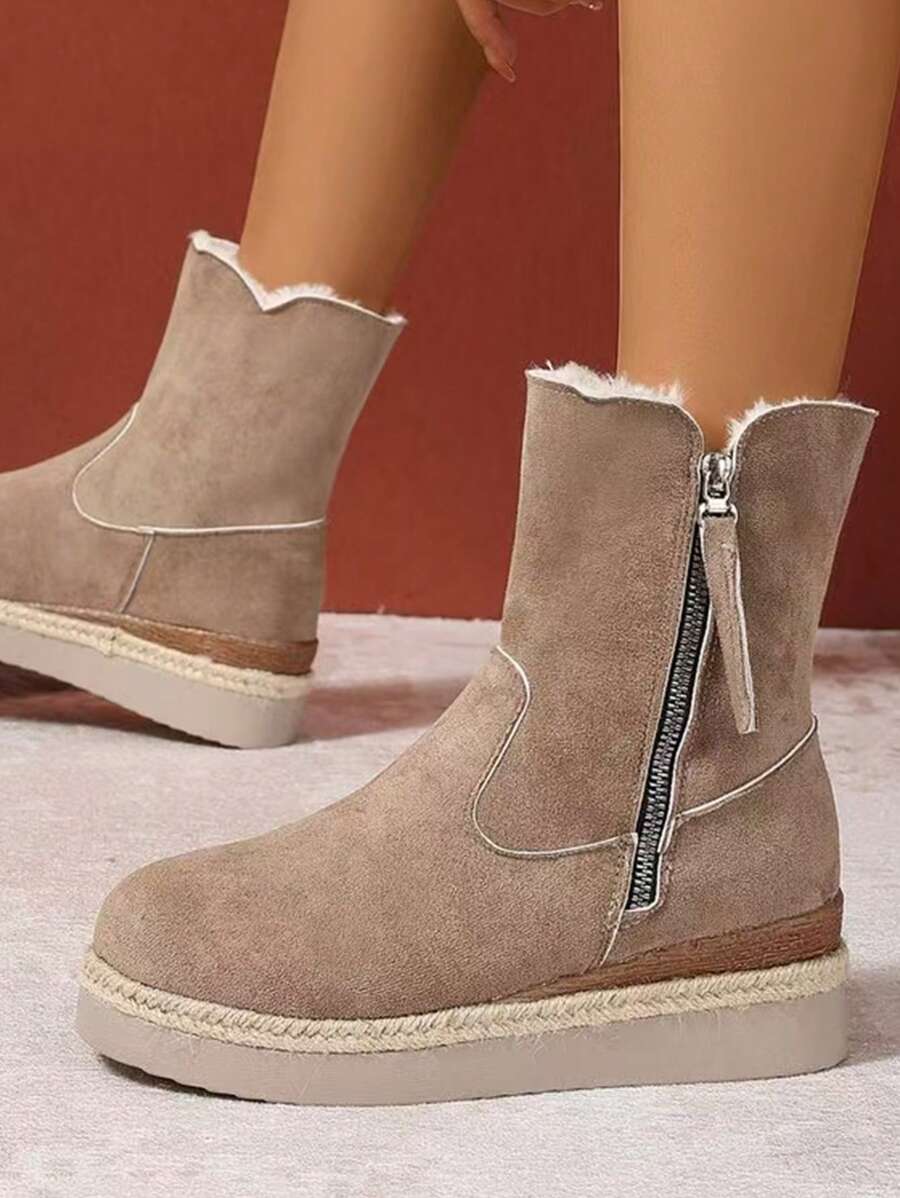 Warme-Stiefeletten-mit-weichem-Kunstfellfutter,-seitlichem-Reißverschluss-und-rustikalem-Design,-perfekt-für-einen-bequemen-Winter-Look.