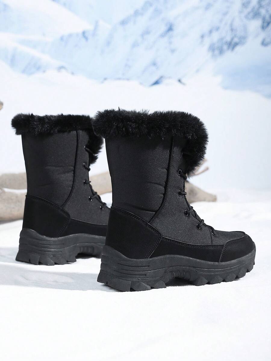 Winterstiefel-mit-flauschigem-Fellkragen-und-robuster-Sohle,-ideal-für-schneereiches-Wetter-und-Wärme.
