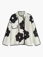 blumenmuster-statement-jacke-mit-kontrastpaspelierung