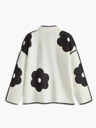 blumenmuster-statement-jacke-mit-kontrastpaspelierung