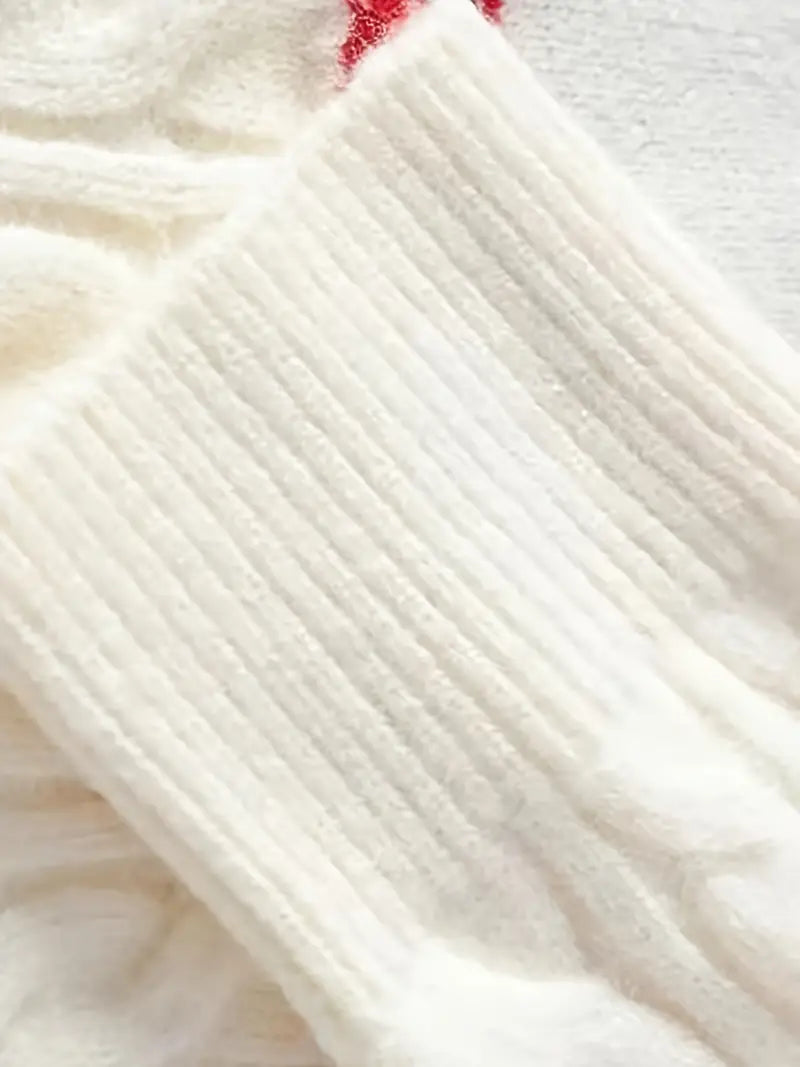 Ein-schwarzer-Pullover-mit-weißen-Rentier-und-Schneeflocken-Mustern,-perfekt-für-die-Winter-und-Weihnachtssaison