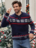 Ein-dunkelblauer-Strickpullover-mit-rotem-und-weißem-Schneeflocken-und-Rauten-Muster,-perfekt-für-festliche-Wintertage