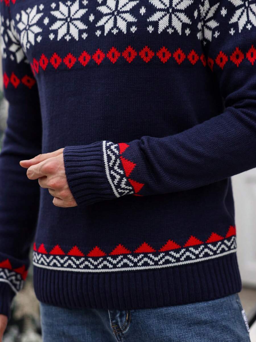 Ein-dunkelblauer-Strickpullover-mit-rotem-und-weißem-Schneeflocken-und-Rauten-Muster,-perfekt-für-festliche-Wintertage