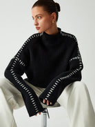 oversize-strickpullover-seitenansicht-weite-ärmel-auffällige-nähte