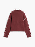 oversize-strickpullover-seitenansicht-weite-ärmel-auffällige-nähte