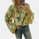 boho-bluse-mit-blumenmuster-und-fließenden-ärmeln